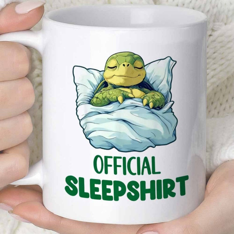 Tailorly White Ceramic 11 oz Mug - Official Sleepshirt Adorable Small Green Turtle Resting Tucked Inside Cozy Soft White Bedding Turtle