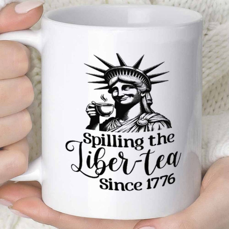 Tailorly White Ceramic 11 oz Mug - Spilling The Liber-tea Since 1776 Classic Lady Liberty Holding A Small Steaming Cup Of Morning Tea Statue