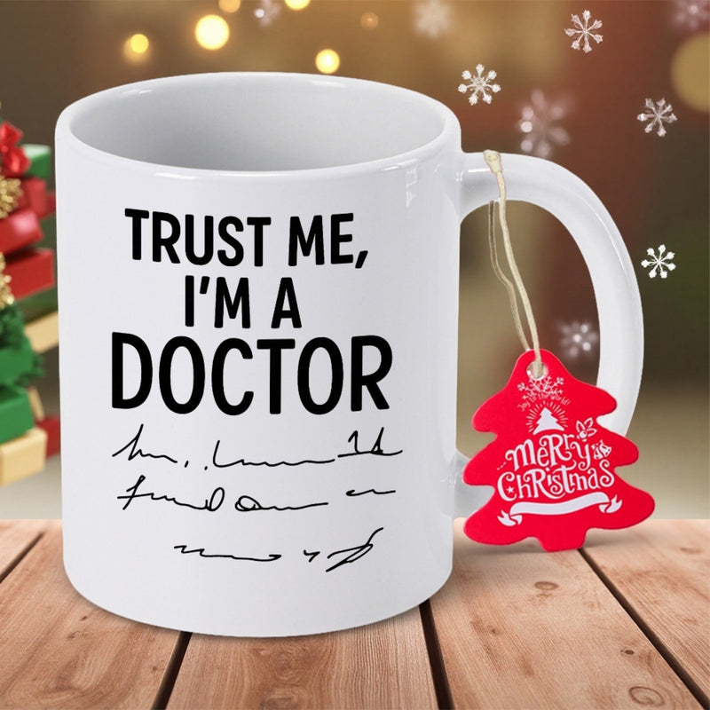 Tailorly White Ceramic 11 oz Mug - Trust Me Im A Doctor Merry Christmas Minimalist White Ceramic Piece Featuring Bold Black Lettering And Festive Tag Mug