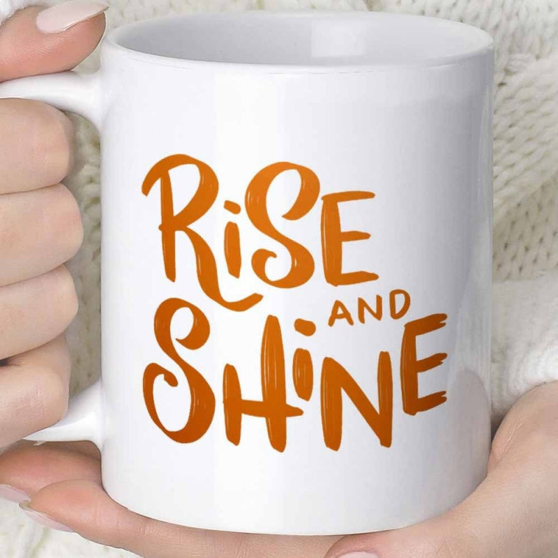 Tailorly White Ceramic 11 oz Mug - Rise And Shine Artistic Handwritten Lettering Style Featuring Bold Orange Positive Quote Typography