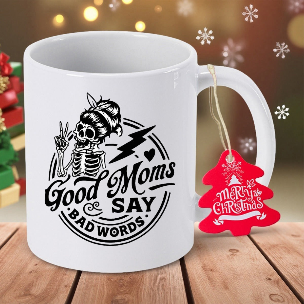 Tailorly White Ceramic 11 oz Mug - Good Moms Say Bad Words Merry Christmas Stylized Skeleton With Messy Bun Making Peace Sign Graphic Skeleton