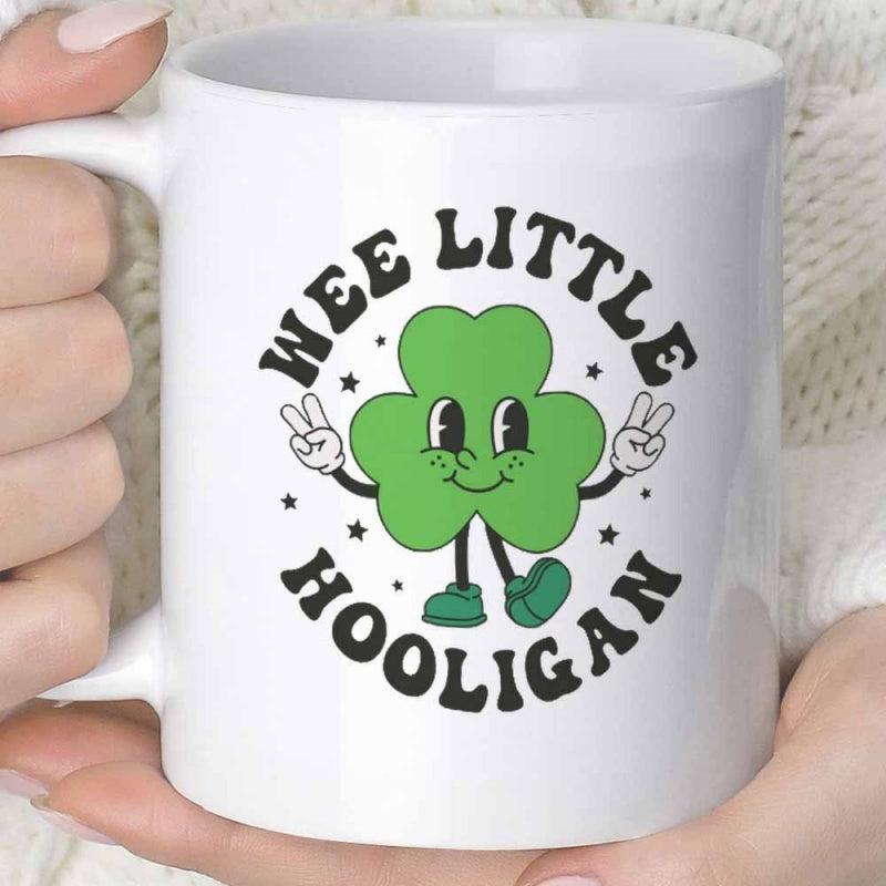 Tailorly White Ceramic 11 oz Mug - Wee Little Hooligan Smiling Green Cartoon Character With White Gloves Making Peace Signs Shamrock