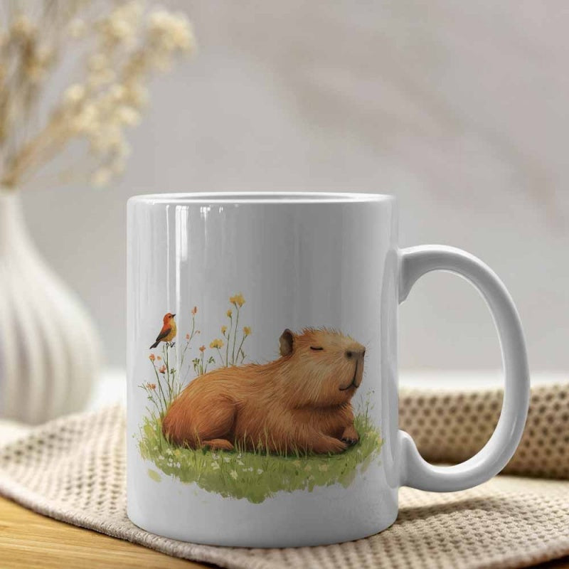 Tailorly White Ceramic 11 oz Mug - Peaceful Animal Resting On Green Grass With Small Bird And Wild Flowers Capybara