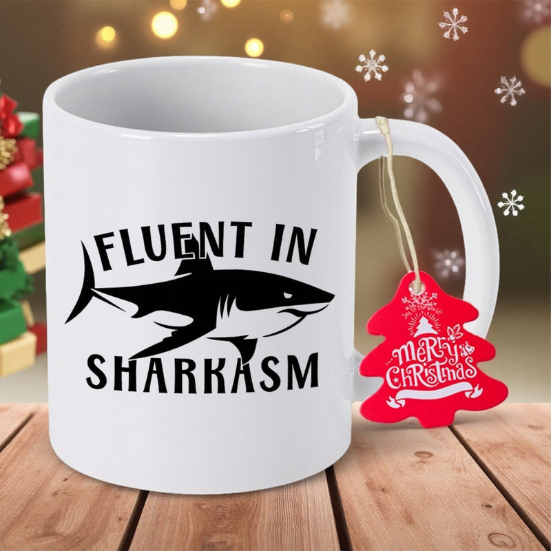 Tailorly White Ceramic 11 oz Mug - Fluent In Sharkasm Sleek Black Silhouette Swimming Through Bold Minimalist Decorative Typography Design Shark