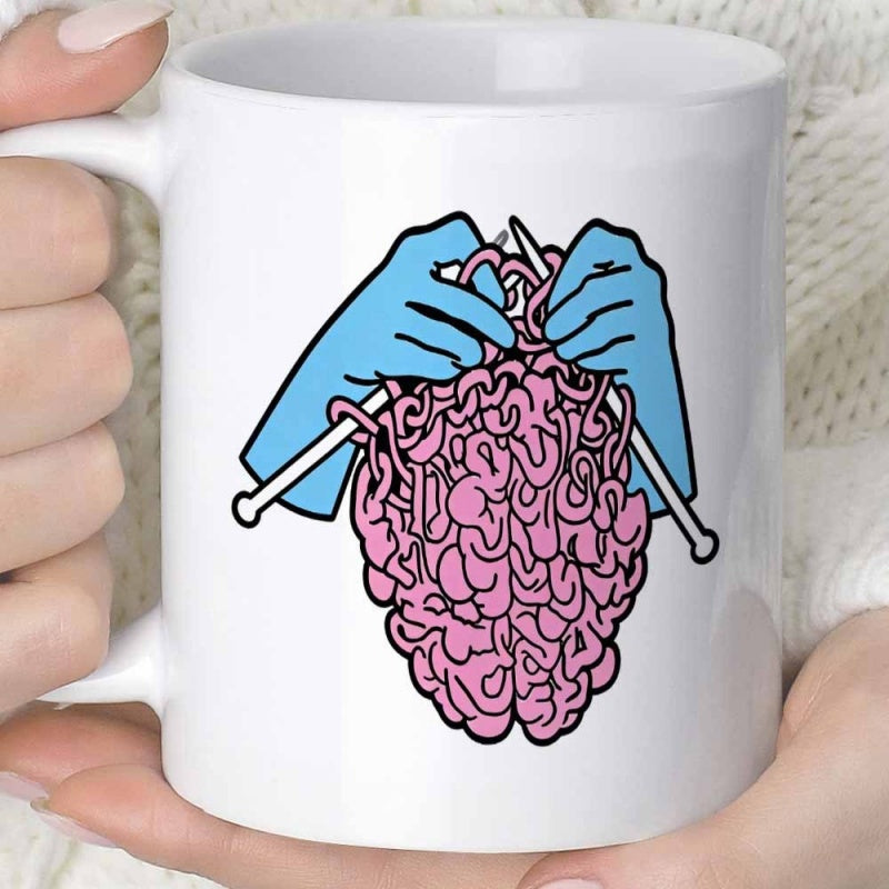 Tailorly White Ceramic 11 oz Mug - Blue Gloved Hands Knitting A Pink Human Yarn Style Brain