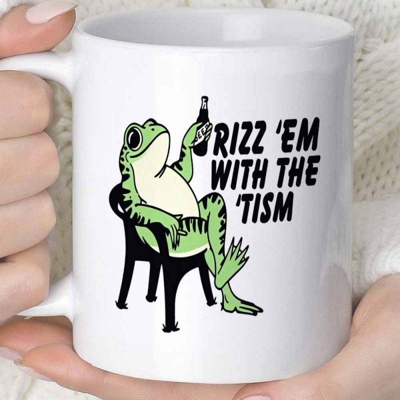 Tailorly White Ceramic 11 oz Mug - Rizz Em With The Tism Relaxed Green Frog Sitting In A Chair Holding A Bottle Frog