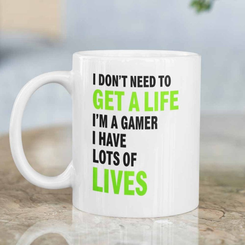 Tailorly White Ceramic 11 oz Mug - I Dont Need To Get A Life Im A Gamer I Have Lots Of Lives Minimalist Bold Black And Green Typography Styling On White Background