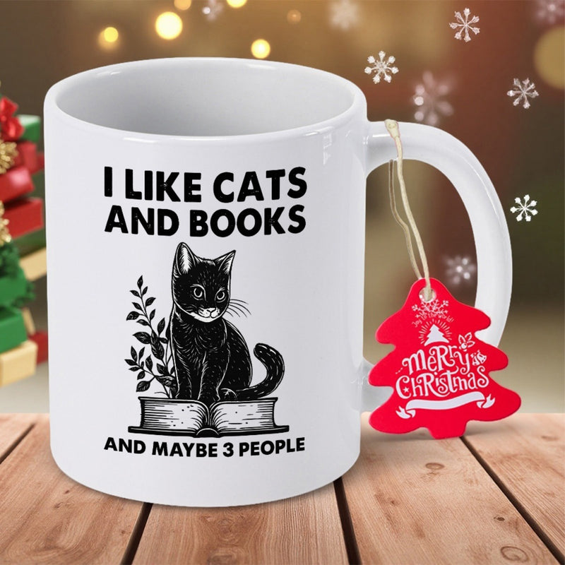 Tailorly White Ceramic 11 oz Mug - I Like Cats And Books And Maybe 3 People Sitting Peacefully On An Open Book Surrounded By Branch Leaves Cat