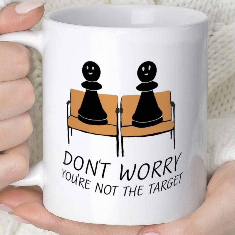 Tailorly White Ceramic 11 oz Mug - Dont Worry Youre Not The Target Two Black Chess Pieces Sitting On Brown Benches Smiling Pawn