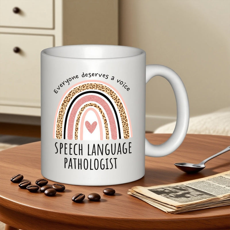 Tailorly White Ceramic 11 oz Mug - Everyone Deserves A Voice Speech Language Pathologist Stylized Leopard Pattern Rainbow With Pink Heart Under Arched Text Mug