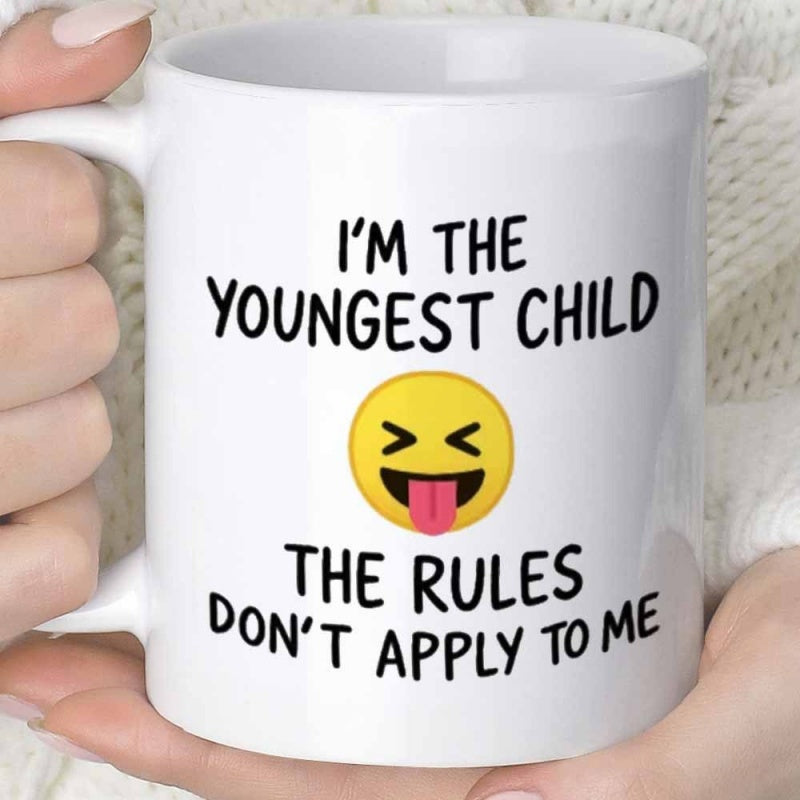 Tailorly White Ceramic 11 oz Mug - Im The Youngest Child The Rules Dont Apply To Me Yellow Playful Face Sticking Out Tongue With Closed Squinting Eyes Emoji