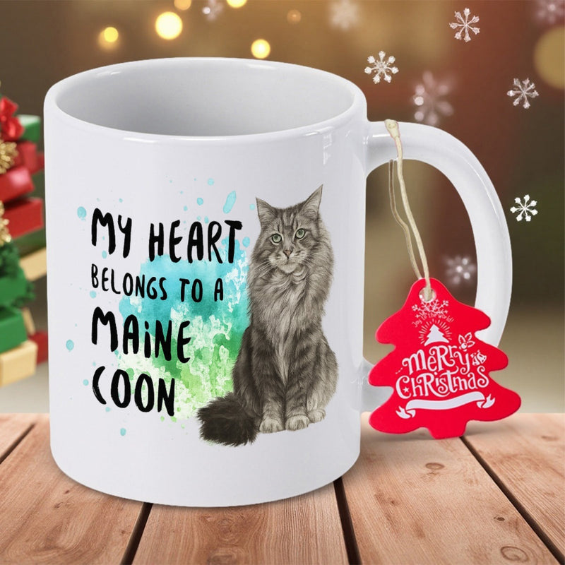 Tailorly White Ceramic 11 oz Mug - My Heart Belongs To A Maine Coon Merry Christmas Beautiful Fluffy Long Haired Cat Sitting Beside Colorful Watercolor Splash Cat