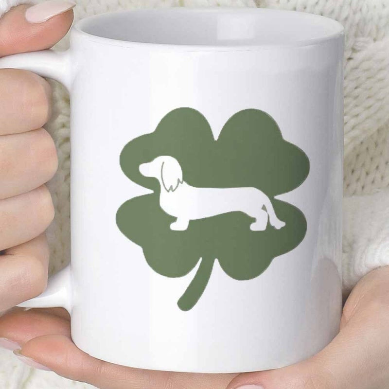 Tailorly White Ceramic 11 oz Mug - Simple Green Four Leaf Clover Featuring A White Silhouette Long Haired Dachshund