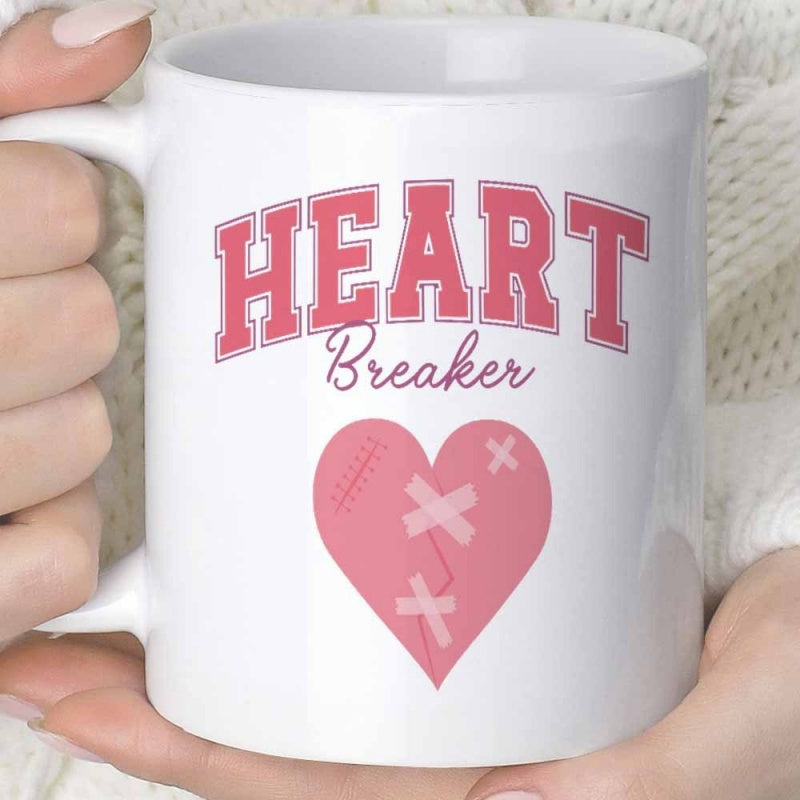 Tailorly White Ceramic 11 oz Mug - Heart Breaker Mended Pink Graphic With Cross Bandages Stitches And Cracks Heart