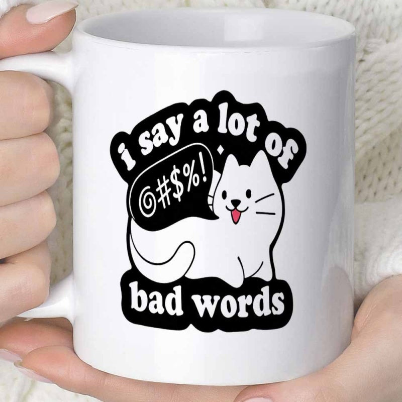 Tailorly White Ceramic 11 oz Mug - I Say A Lot Of Bad Words Simple White Cartoon Cat Sticking Its Tongue Out With Black Speech Bubble Cat