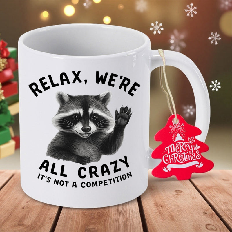 Tailorly White Ceramic 11 oz Mug - Relax We Are All Crazy It Is Not A Competition Fluffy Forest Animal Waving One Paw On Raccoon