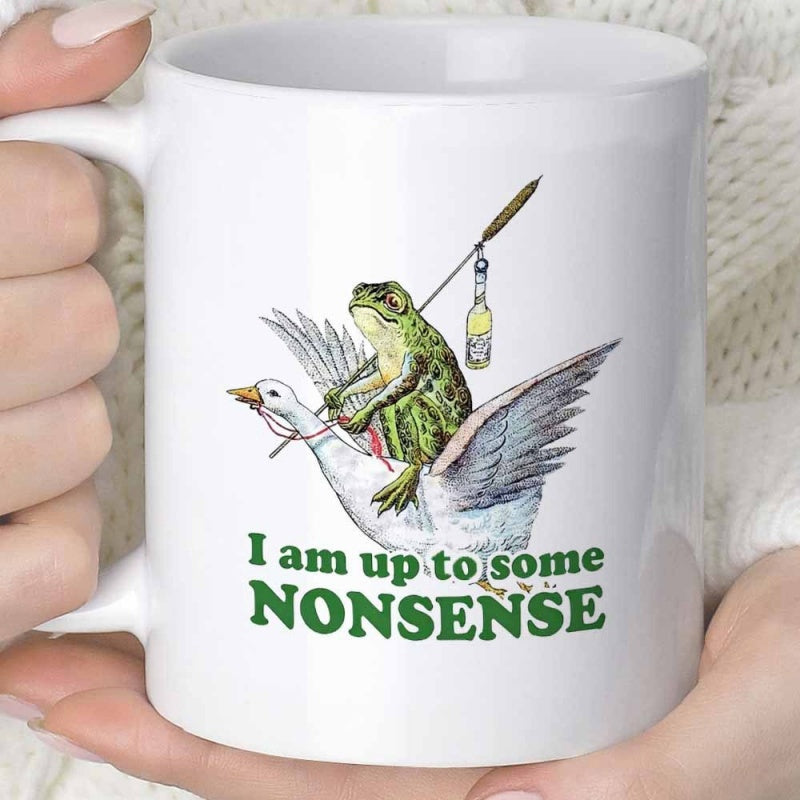 Tailorly White Ceramic 11 oz Mug - I Am Up To Some Nonsense Whimsical Green Frog Riding On A Majestic Flying White Goose