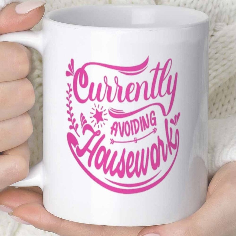 Tailorly White Ceramic 11 oz Mug - Currently Avoiding Housework Stylized Pink Artistic Letters With Decorative Floral Flourishes And Star Accents Typographic Sign