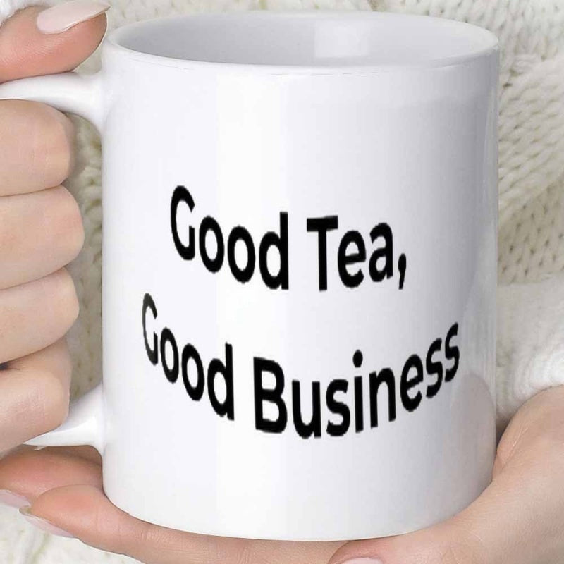 Tailorly White Ceramic 11 oz Mug - Good Tea Good Business Minimalist White Ceramic Vessel Held By Hands In Cozy Setting Mug