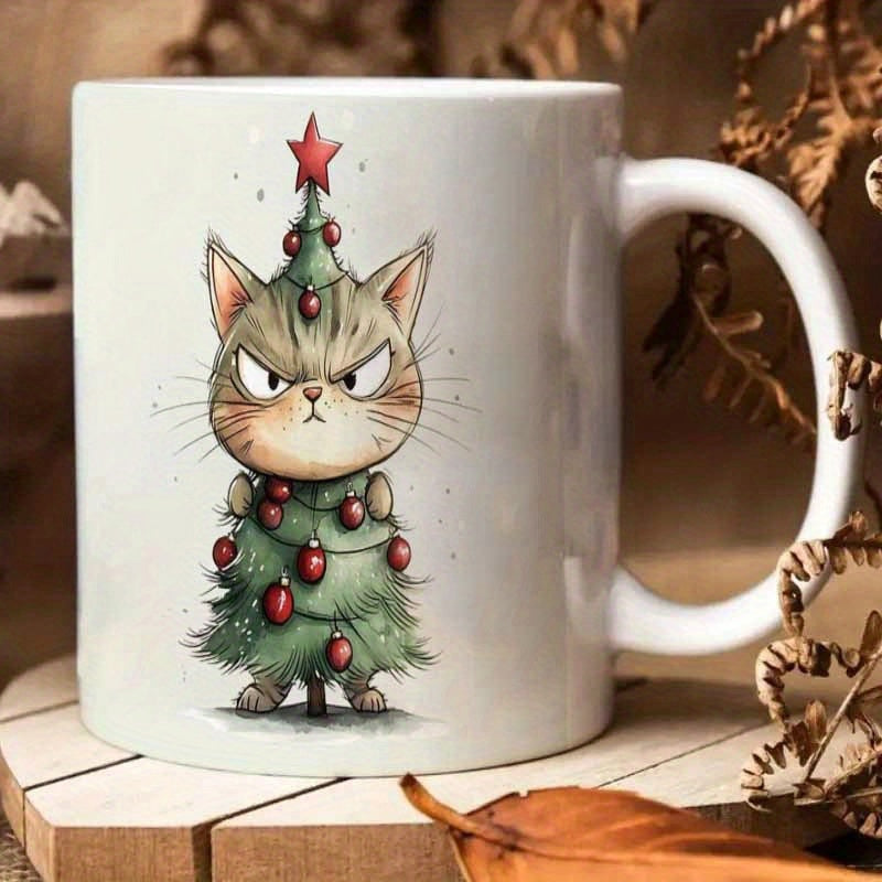 Tailorly White Ceramic 11 oz Mug - Grumpy Brown Tabby Wearing A Green Festive Christmas Tree Costume Ornamented Cat