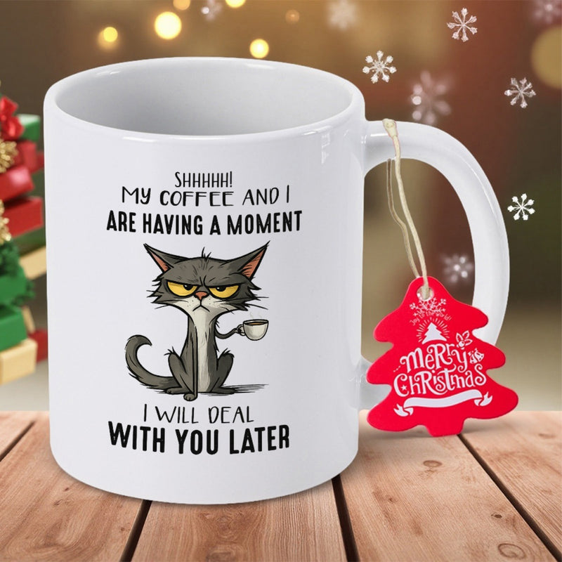 Tailorly White Ceramic 11 oz Mug - Shhhhh My Coffee And I Are Having A Moment I Will Deal With You Later Merry Christmas Grumpy Grey Cartoon Feline Holding A Tiny