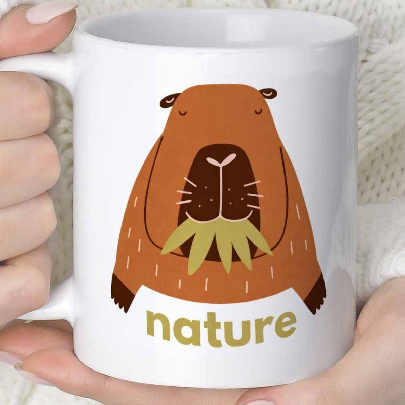 Tailorly White Ceramic 11 oz Mug - Nature Adorable Stylized Brown Capybara Eating Green Leaves Resting Within Natural Scene Capybara
