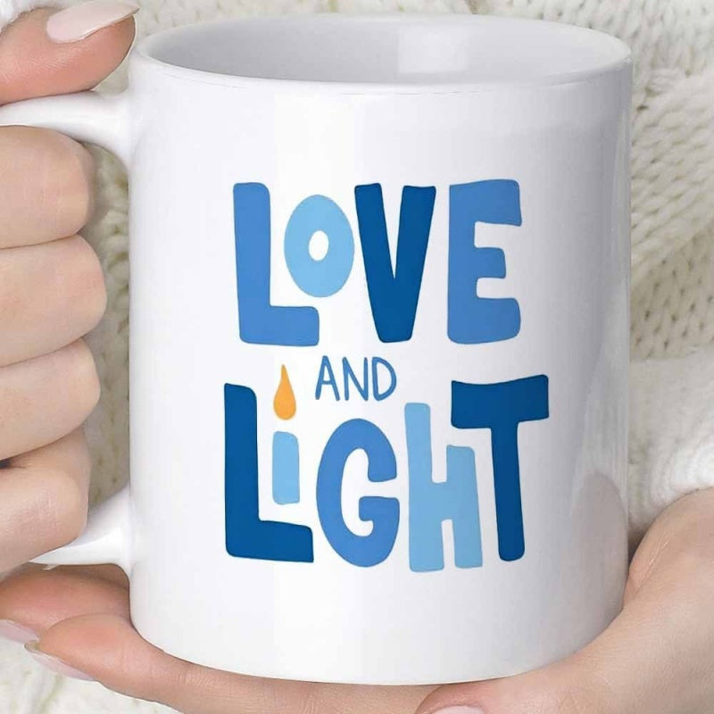 Tailorly White Ceramic 11 oz Mug - Love And Light Vibrant Blue Artistic Lettering Featuring A Small Glowing Golden Flame Candle