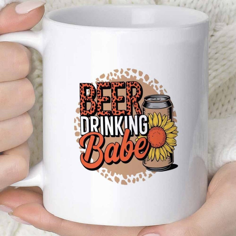 Tailorly White Ceramic 11 oz Mug - Beer Drinking Babe Leopard Print Circle Background Featuring A Vibrant Yellow Sunflower Can