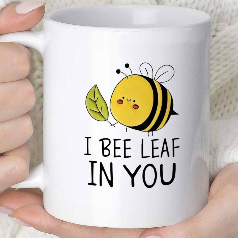 Tailorly White Ceramic 11 oz Mug - I Bee Leaf In You Cute Round Yellow Cartoon Bumblebee Holding A Tiny Green Leaf Bee