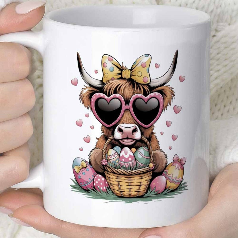 Tailorly White Ceramic 11 oz Mug - Adorable Shaggy Highland Cow Wearing Pink Sunglasses Holding Colorful Easter Eggs Cow