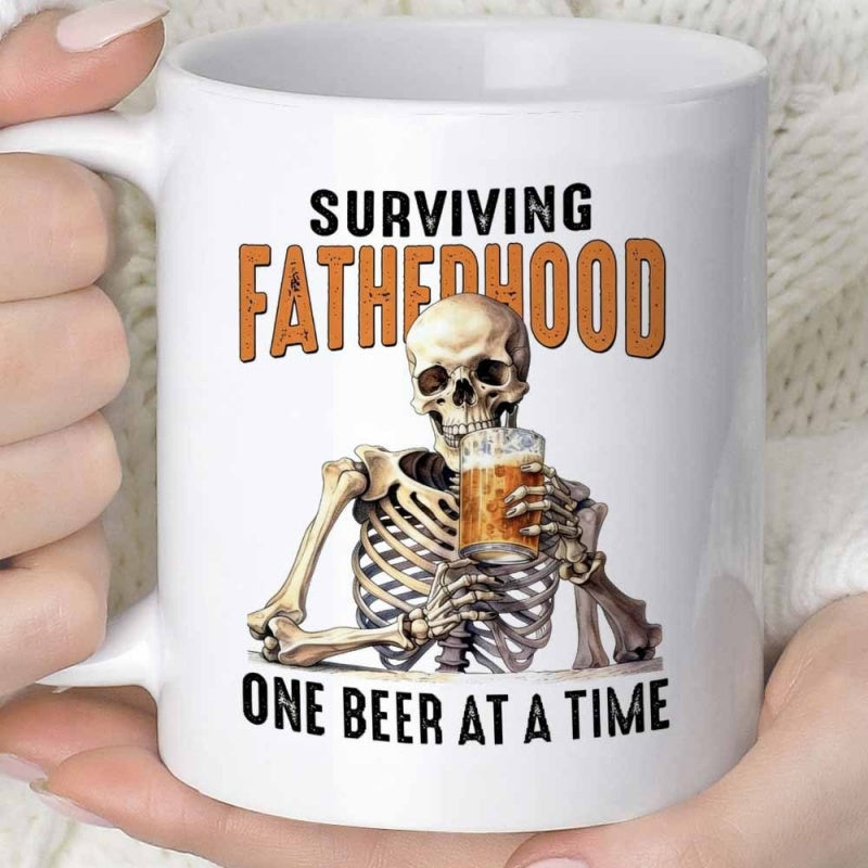 Tailorly White Ceramic 11 oz Mug - Surviving Fatherhood One Beer At A Time Skeletal Figure Relaxing With A Frothy Cold Glass Of Golden Beer