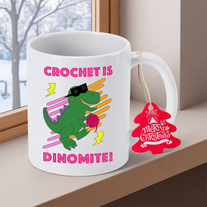 Tailorly White Ceramic 11 oz Mug - Crochet Is Dinomite Green Cartoon With Sunglasses Holding A Pink Ball Of Yarn Dinosaur