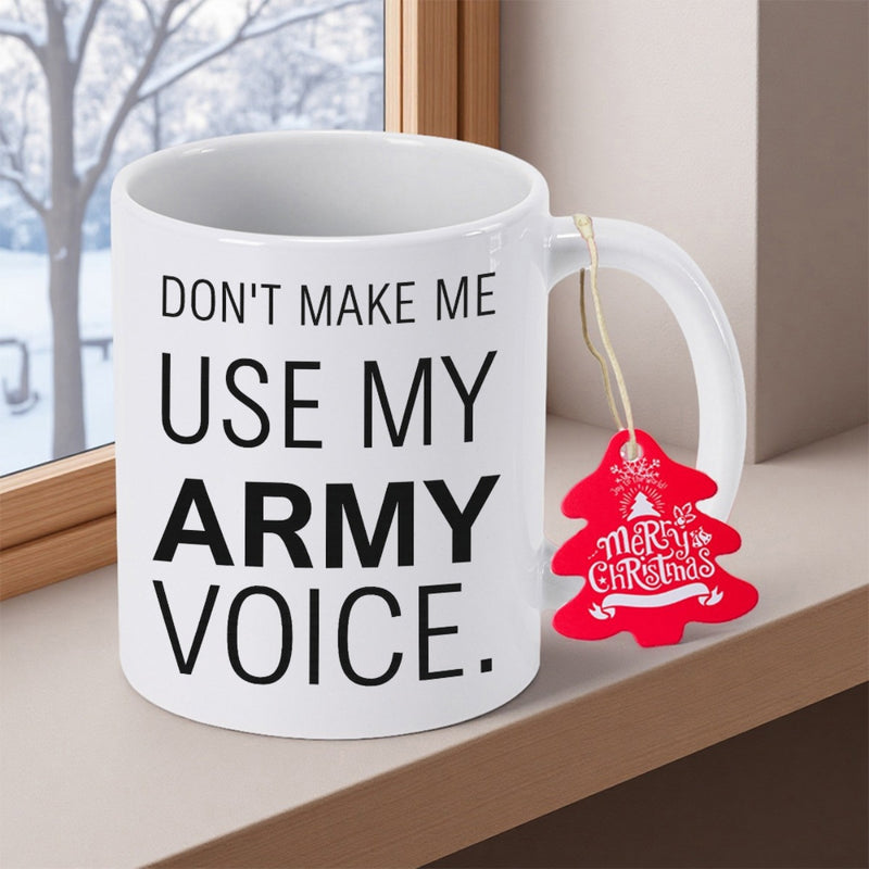 Tailorly White Ceramic 11 oz Mug - Don't Make Me Use My Army Voice Merry Christmas Simple Minimalist White Ceramic Coffee Cup Resting On A Windowsill Mug