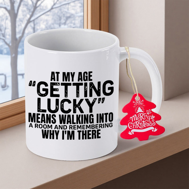 Tailorly White Ceramic 11 oz Mug - At My Age Getting Lucky Means Walking Into A Room And Remembering Why I Am There Merry Christmas Clean White Ceramic Cup Resting