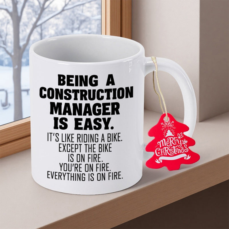 Tailorly White Ceramic 11 oz Mug - Being A Construction Manager Is Easy Professional Ceramic Coffee Cup With Bold Typography And Red Festive Tag Mug