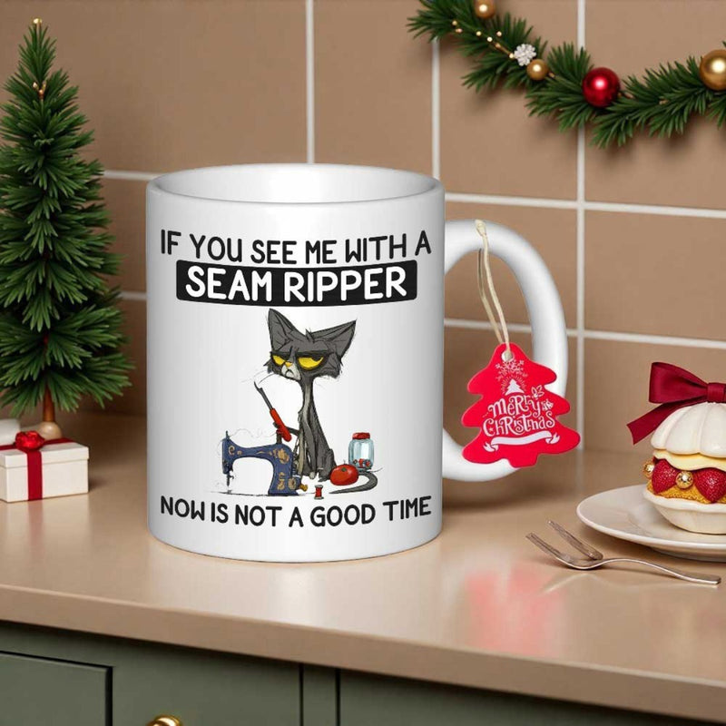 Tailorly White Ceramic 11 oz Mug - If You See Me With A Seam Ripper Now Is Not A Good Time Grumpy Black Cat Sitting Beside Vintage Sewing Machine With Sewing Tools