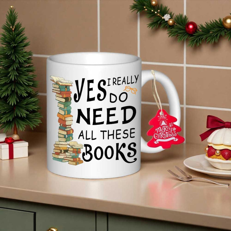 Tailorly White Ceramic 11 oz Mug - Yes I Really Do Need All These Books Colorful Stacked Novels Resting Peacefully Beside Decorative Typography Books