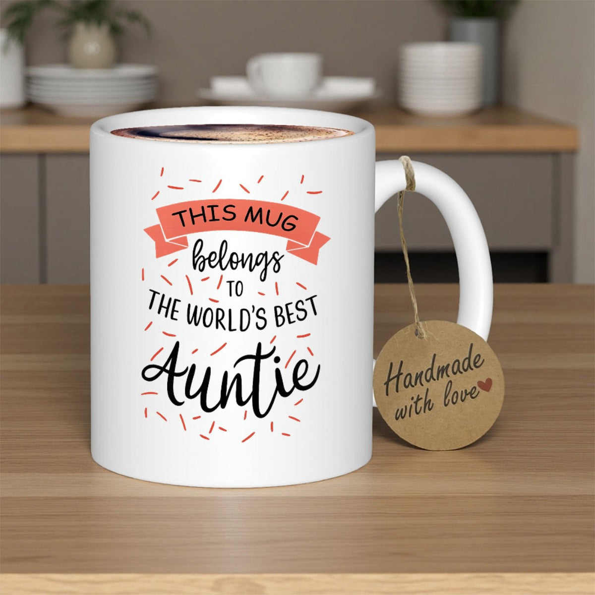 Tailorly White Ceramic 11 oz Mug - This Mug Belongs To The World's Best Auntie Featuring A Red Ribbon Banner With Scattered Decorative Confetti Mug
