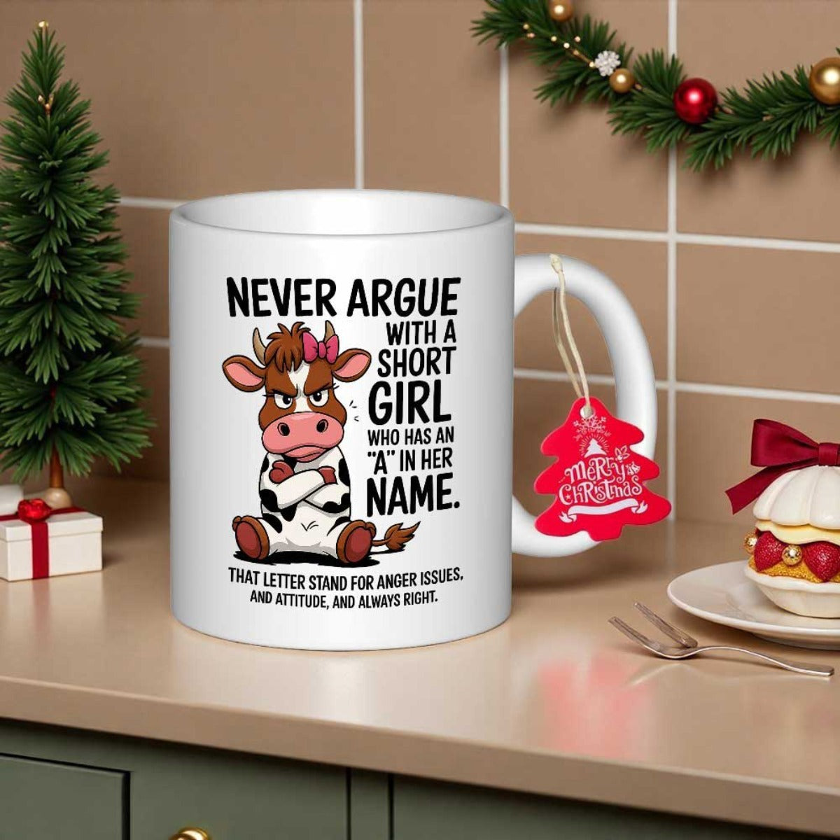 Tailorly White Ceramic 11 oz Mug - Never Argue With A Short Girl Who Has An A In Her Name Grumpy Cartoon Heifer With Pink Bow Sitting On Flat Surface Cow