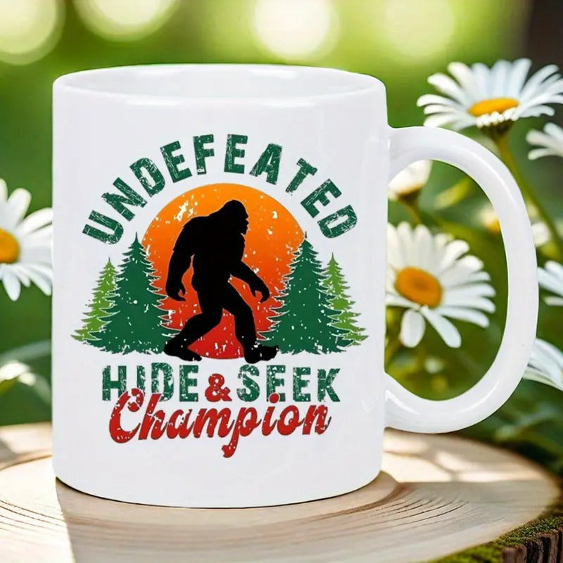 Tailorly White Ceramic 11 oz Mug - Undefeated Hide And Seek Champion Walking Silhouette Among Pine Trees Under A Large Radiant Sunset Bigfoot