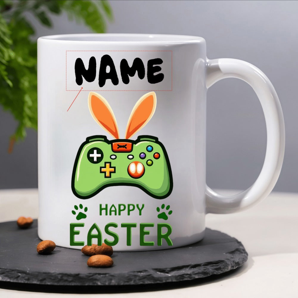 Tailorly White Ceramic 11 oz Mug - Name Happy Easter Green Gaming Controller With Vibrant Orange Bunny Ears Among Small Paws Controller