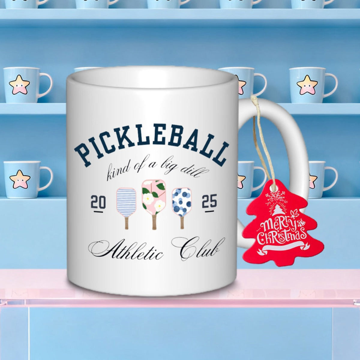 Tailorly White Ceramic 11 oz Mug - Pickleball Kind Of A Big Dill Athletic Club Three Patterned Sports Paddles Featuring Floral And Dotted Designs Among Text Paddle