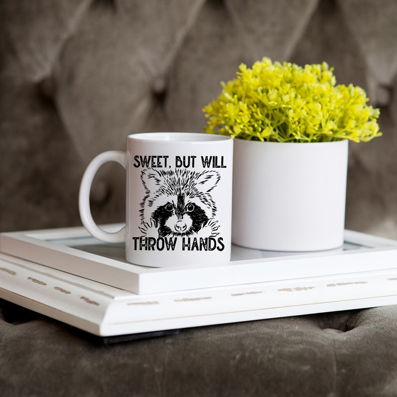Tailorly White Ceramic 11 oz Mug - Sweet But Will Throw Hands Detailed Sketch Of A Curious Raccoon Face With Sharp Black Markings Raccoon