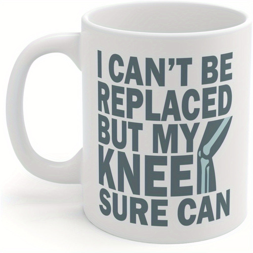 Tailorly White Ceramic 11 oz Mug - I Cant Be Replaced But My Knee Sure Can Bold Block Letters Beside A Stylized Anatomical Joint Replacement Diagram Knee