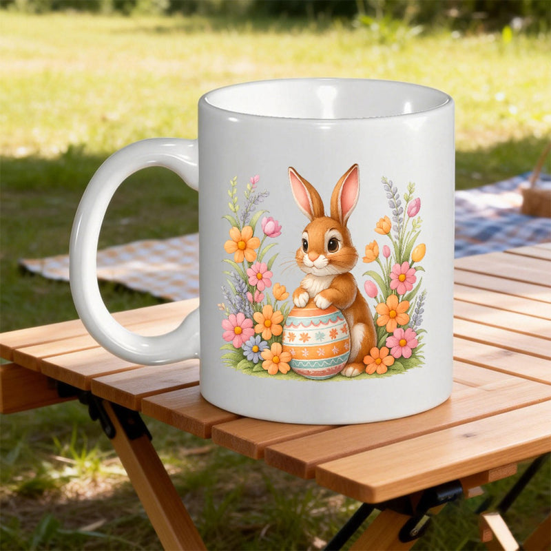 Tailorly White Ceramic 11 oz Mug - Adorable Brown Bunny Holding Colorful Patterned Easter Egg Among Spring Flowers Rabbit