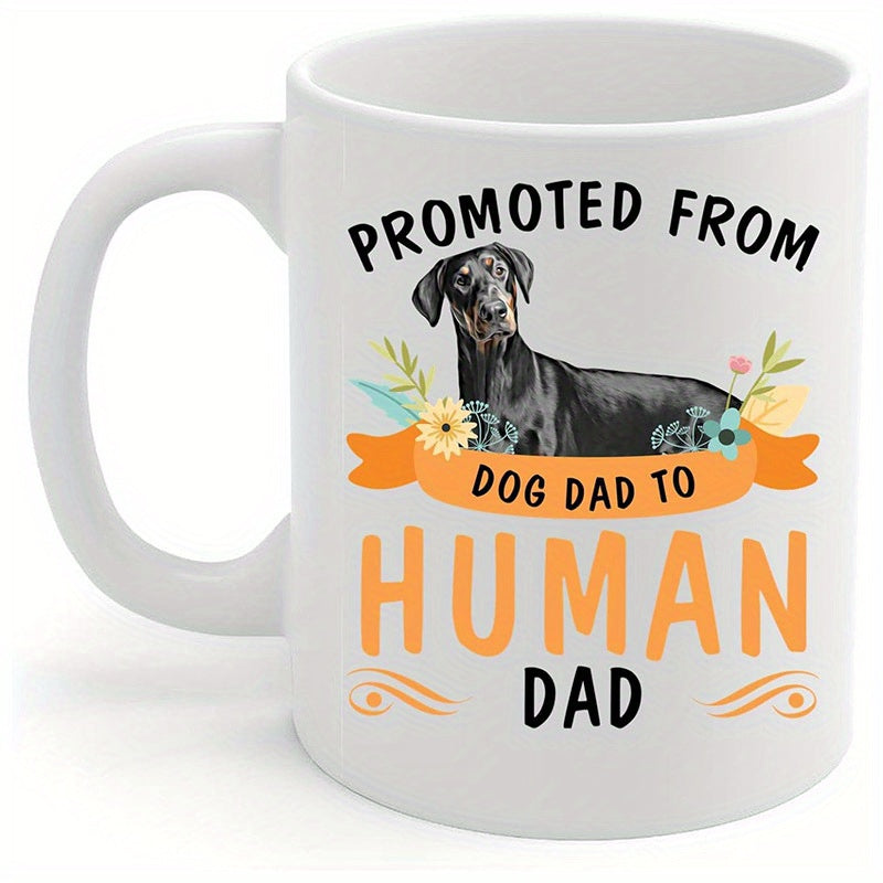 Tailorly White Ceramic 11 oz Mug - Promoted From Dog Dad To Human Dad Majestic Doberman Pinscher Sitting Among Vibrant Floral Blossoms And Banner Dog