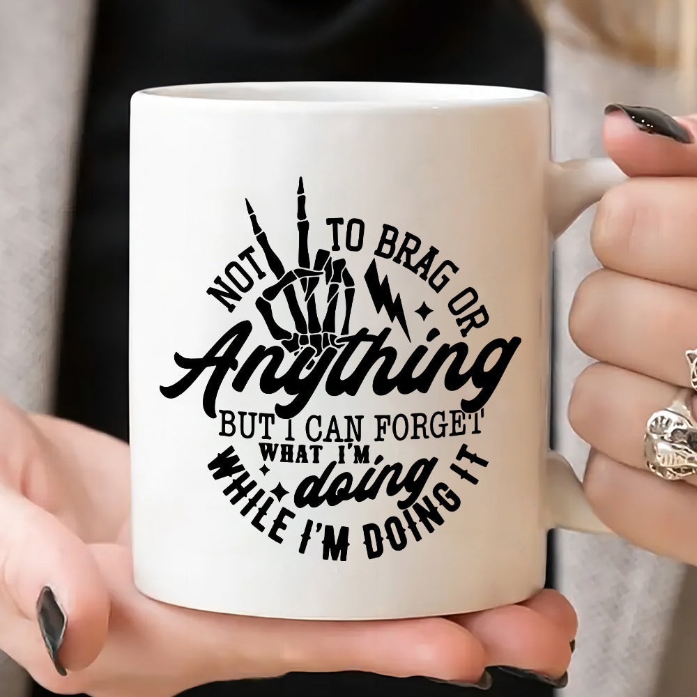 Tailorly White Ceramic 11 oz Mug - Not To Brag Or Anything But I Can Forget What I'm Doing While I'm Doing It Skeleton Hand Making Peace Sign Among Small Lightning