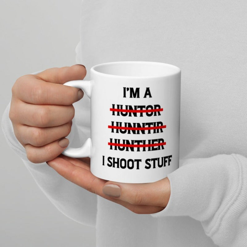 Tailorly White Ceramic 11 oz Mug - Im A Hunter I Shoot Stuff Minimalist White Ceramic Vessel Featuring Humorous Misspelled Text With Red Strike Lines Mug