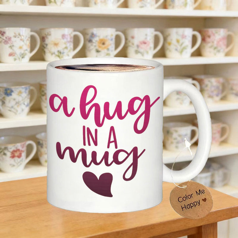 Tailorly White Ceramic 11 oz Mug - A Hug In A Mug Elegant Cursive Script Above A Simple Heart On A Smooth Surface Mug
