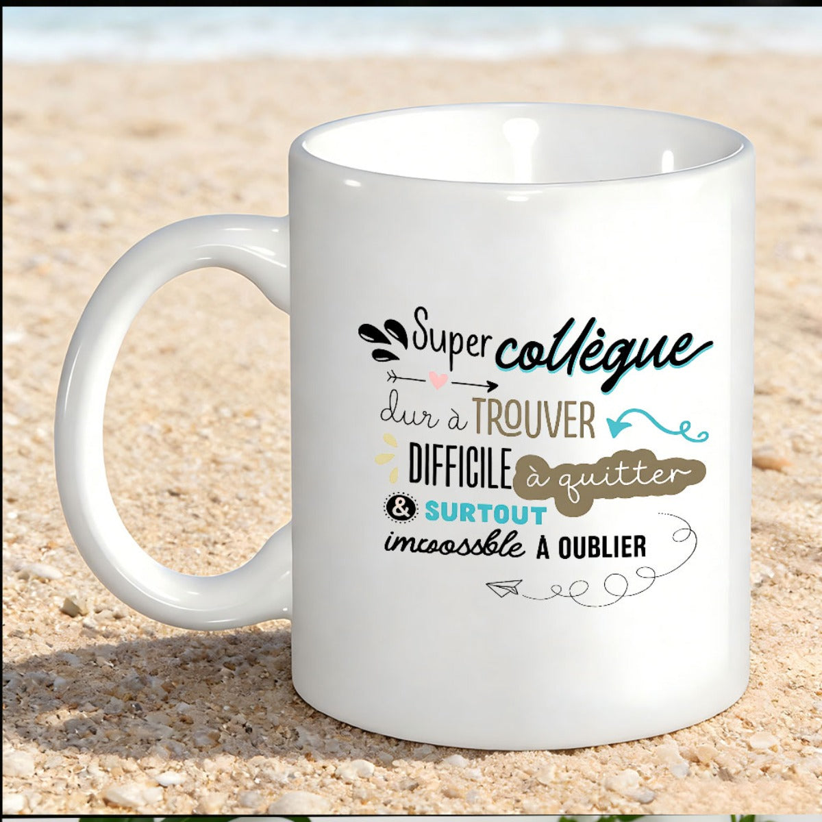 Tailorly White Ceramic 11 oz Mug - Elegant White Ceramic With Decorative Script Phrases Resting On Sand Mug